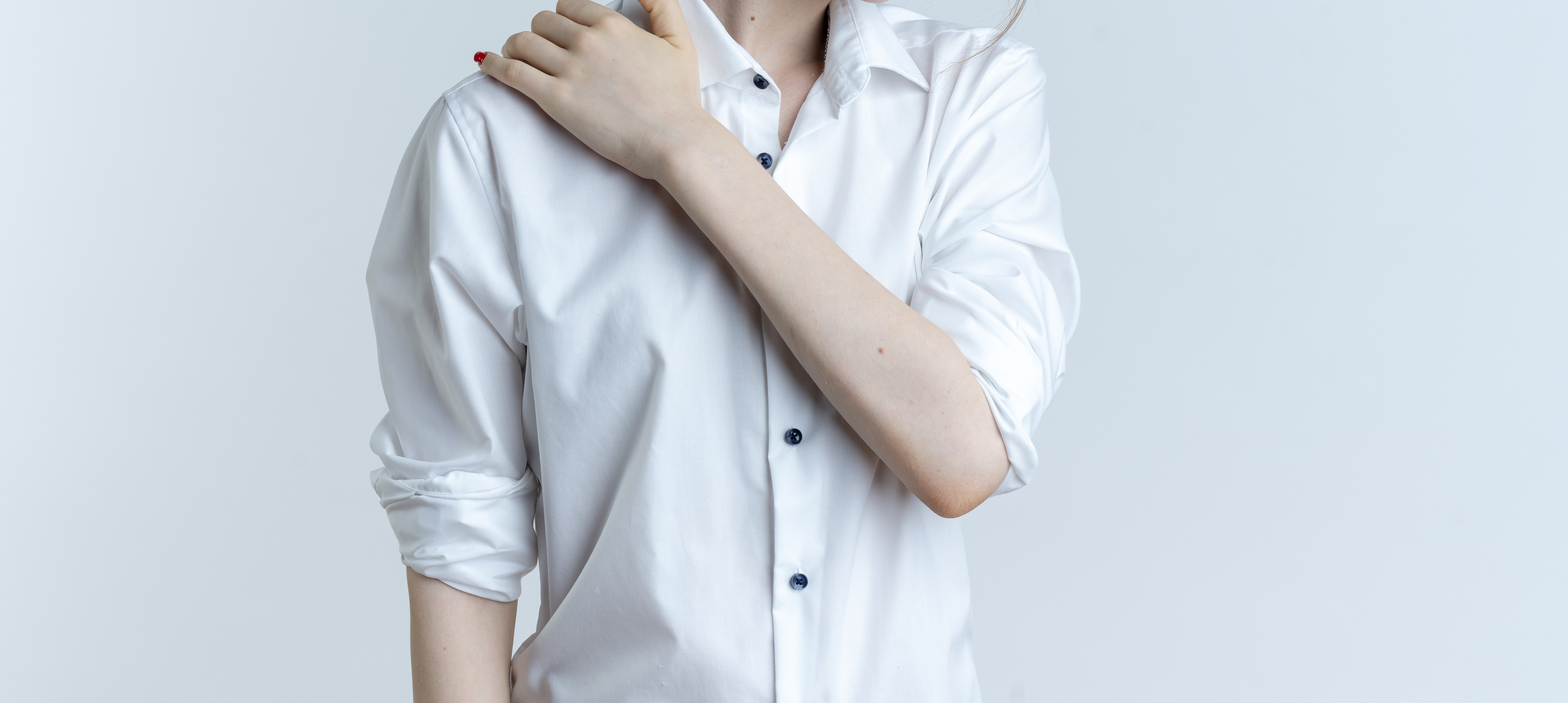 young-aching-blonde-russian-girl-holds-shoulder-isolated-white-space-with-copy-space